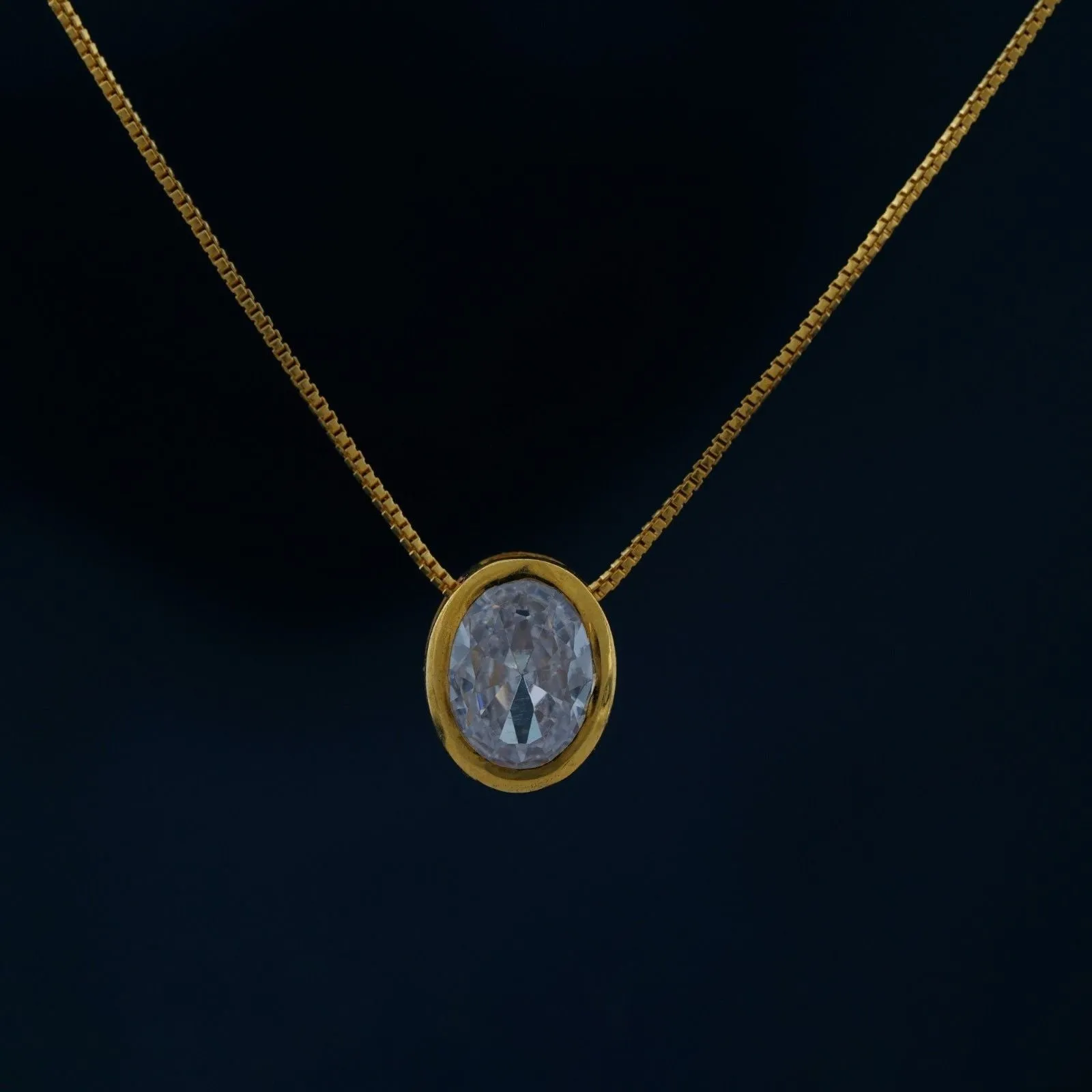 Golden Oval Classic Solitaire Bezel Pendant