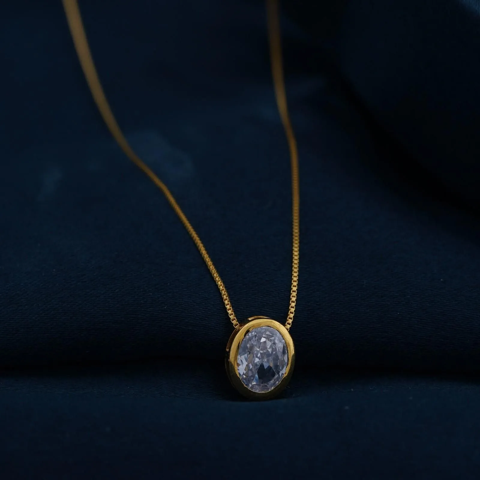 Golden Oval Classic Solitaire Bezel Pendant