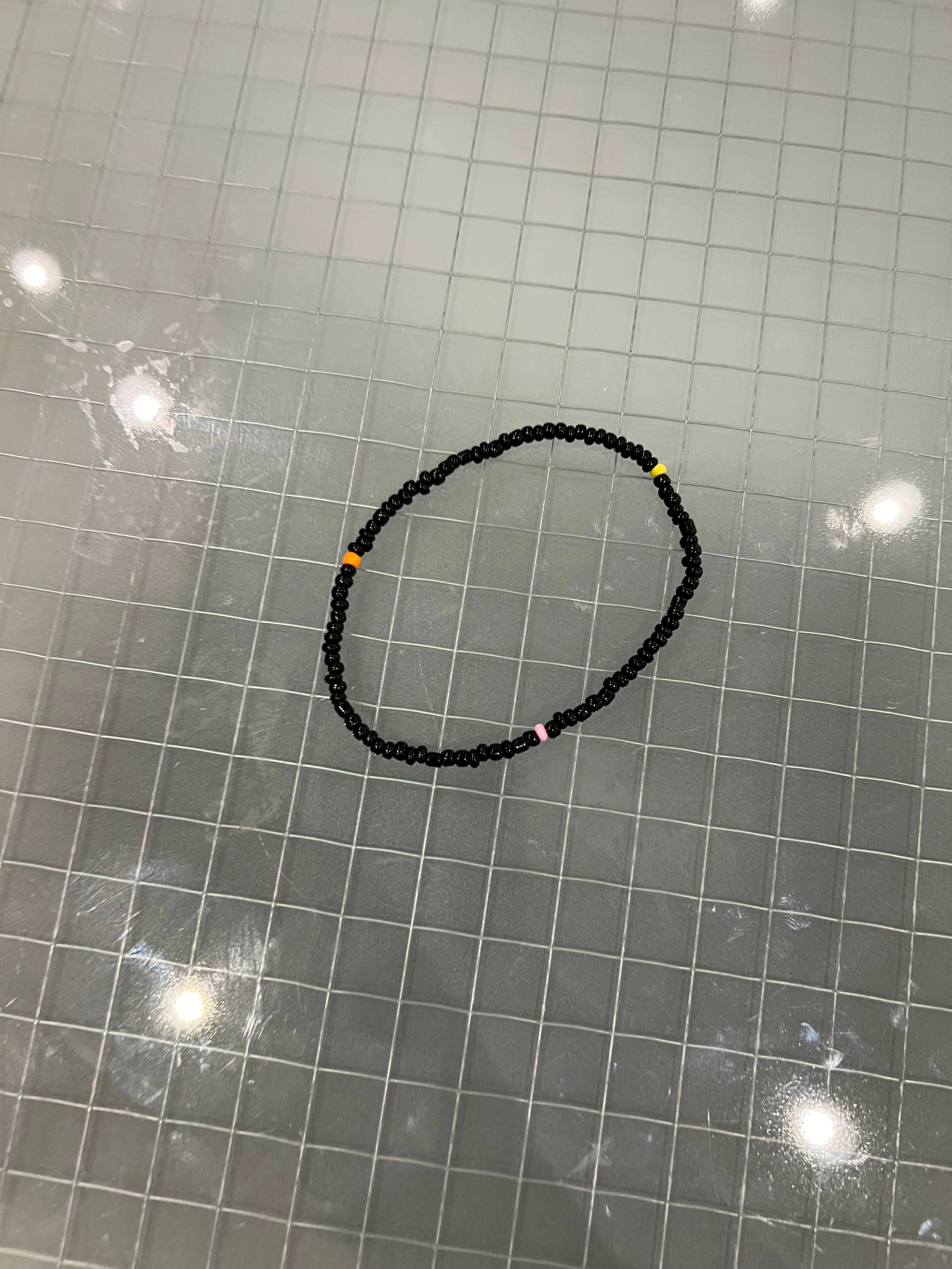 The color black anklet